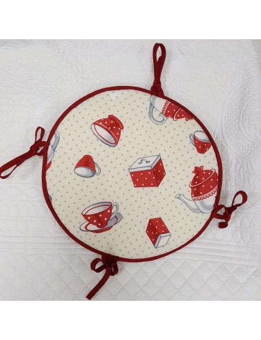 Galleta para taburete Pots, fondo beige teteras naranjas.